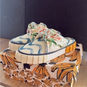 FARM Rio Cream Canvas Floral Bow Mules with Blue Wave and Orange Accent